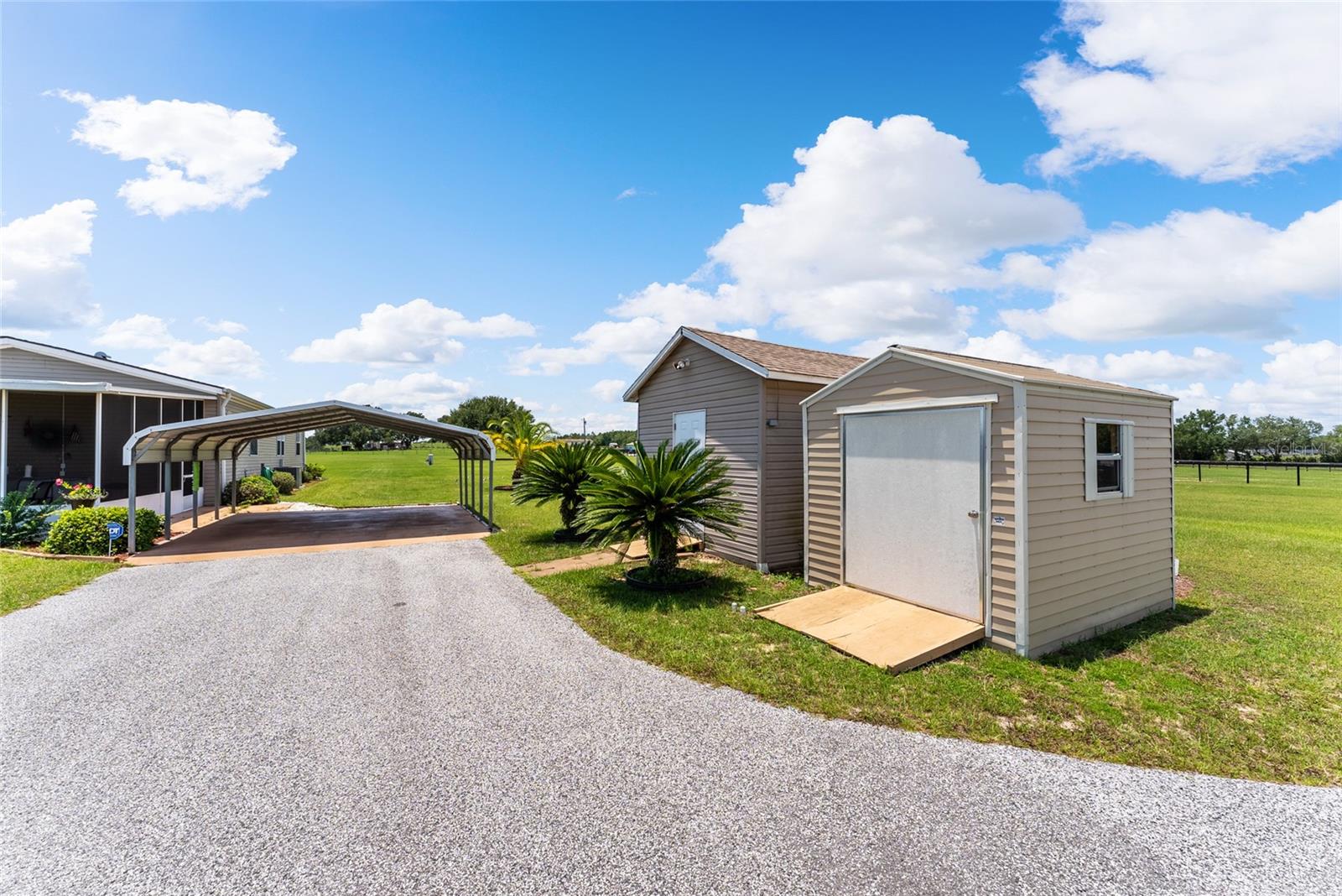 Work shop w/a/c and storage shed w/ramp