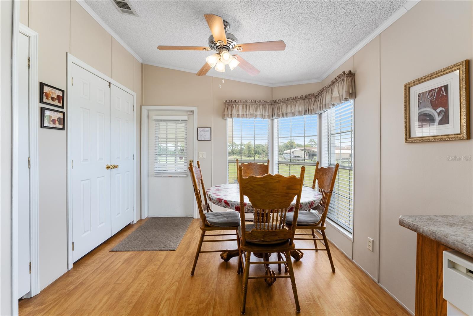 Enter from the screen patio into the eat in Kitchen.  Laundry to the left