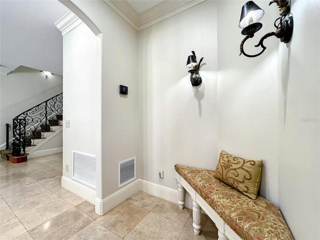 Front Bedroom - east side facing hallway past closets (both sides of hall) and entrance to ensuite bathroom