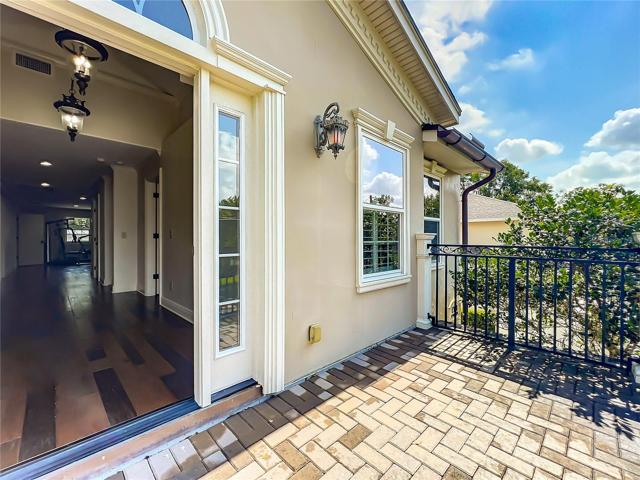 Utility Room w/view towards back door to back porch (yes, a creative half bath/pool bath)