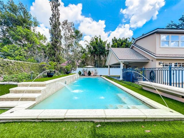 Pool w/covered porch to left