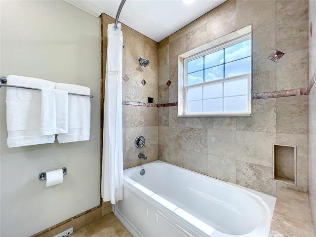 Front Bedroom upstairs - east side with hall to closets and ensuite bathroom