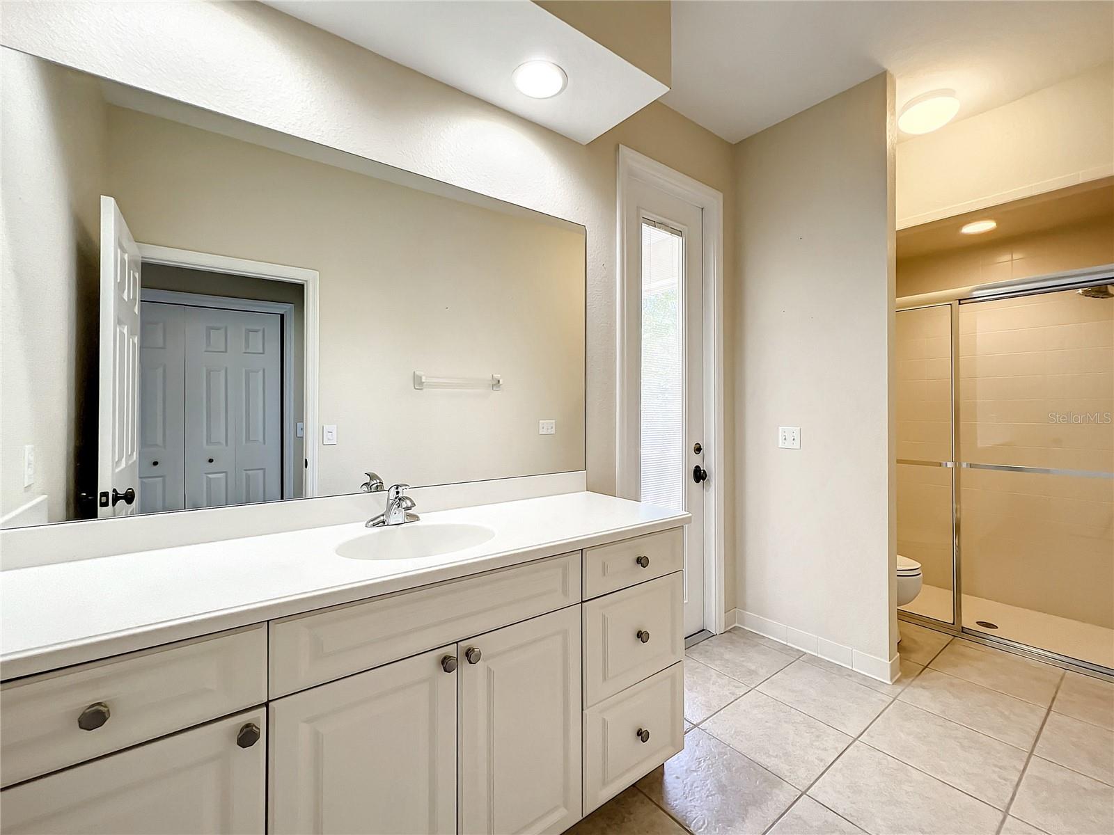 Guest bathroom, entrance/exit to patio!