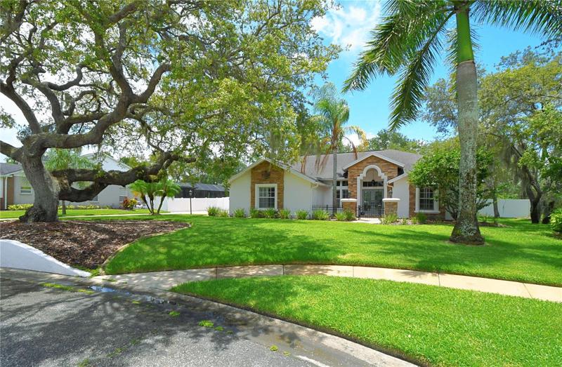 The large cul-de-sac lot provides privacy and abundant greenery!