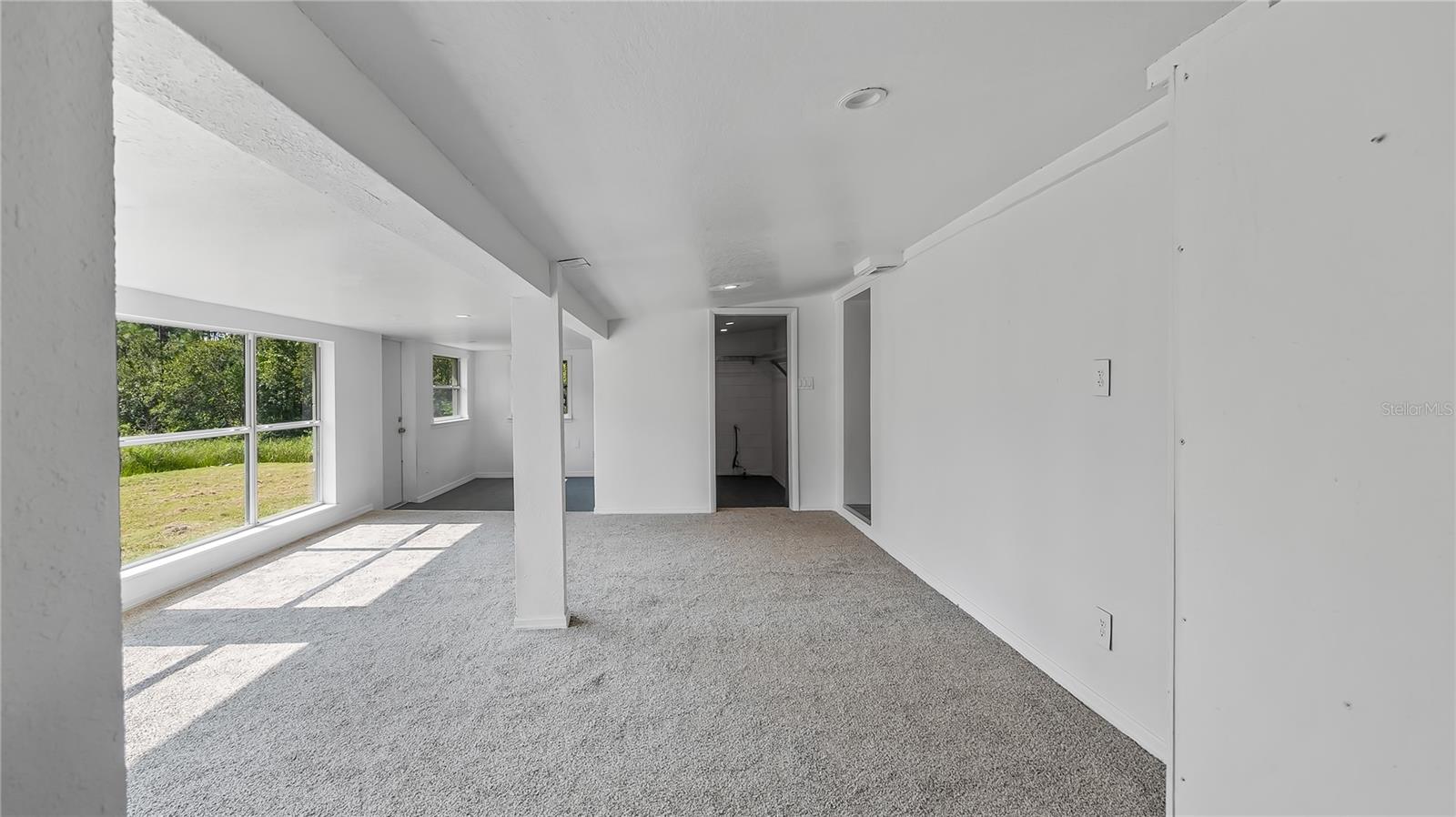 Room off the back of house considered a bedroom with a large walk in closet. Amazing views of the canal.