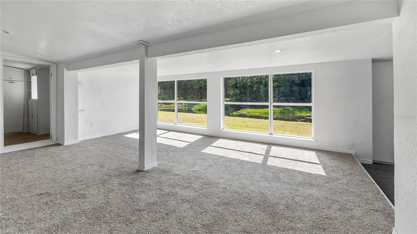 Room off the back of house considered a bedroom with a large walk in closet. Amazing views of the canal.