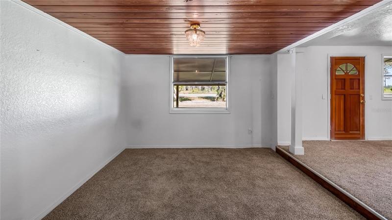 Extra space off of living room and dining room that could be office or separate sitting area