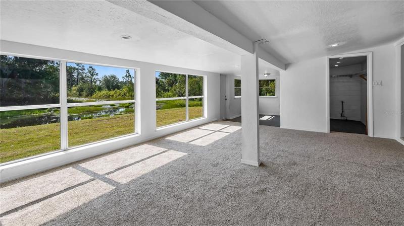 Room off the back of house considered a bedroom with a large walk in closet. Amazing views of the canal.