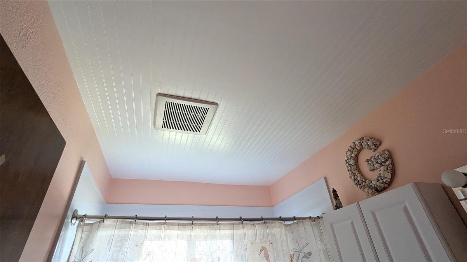 Beautiful beadboard ceiling in bathroom