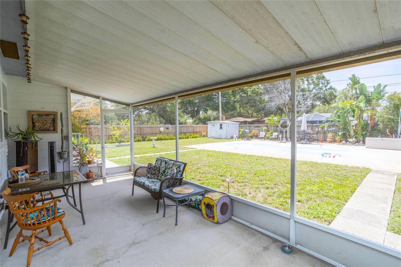 Large screened-in back porch