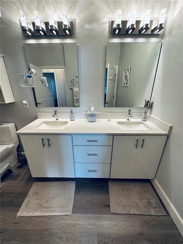Guest bath has dual sinks