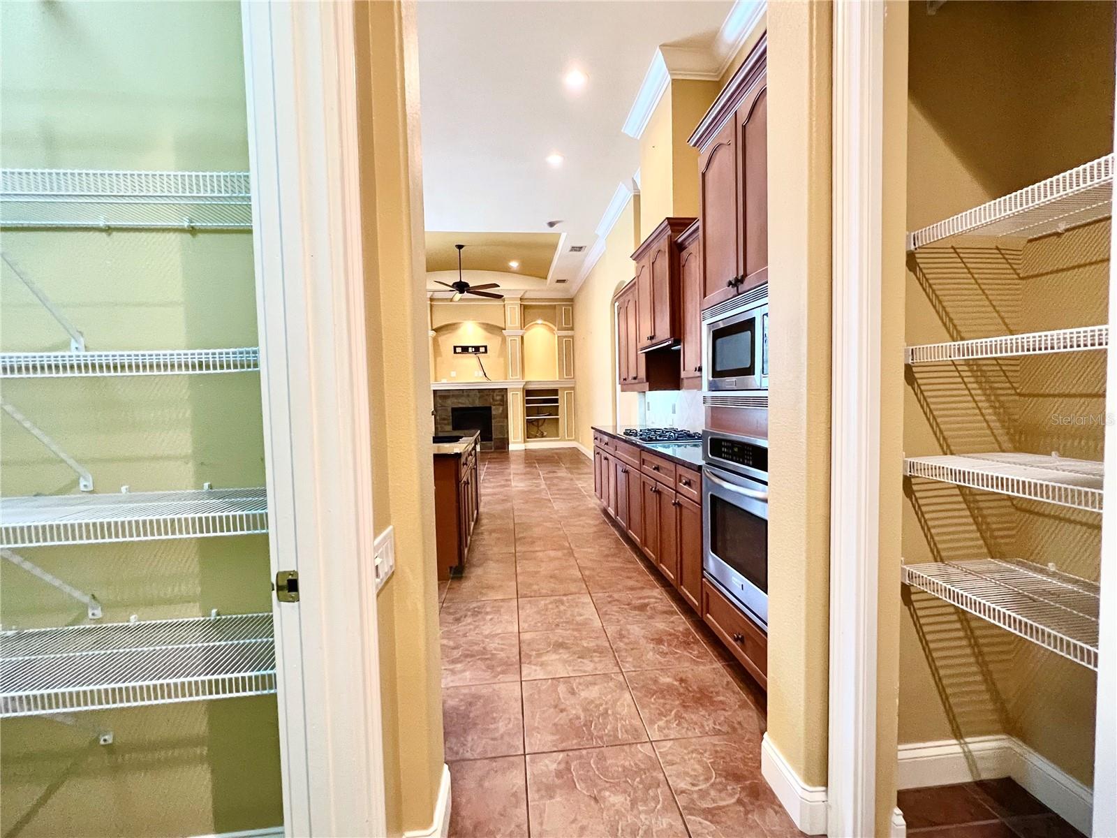 another pantry/storage closet across from walk-in pantry