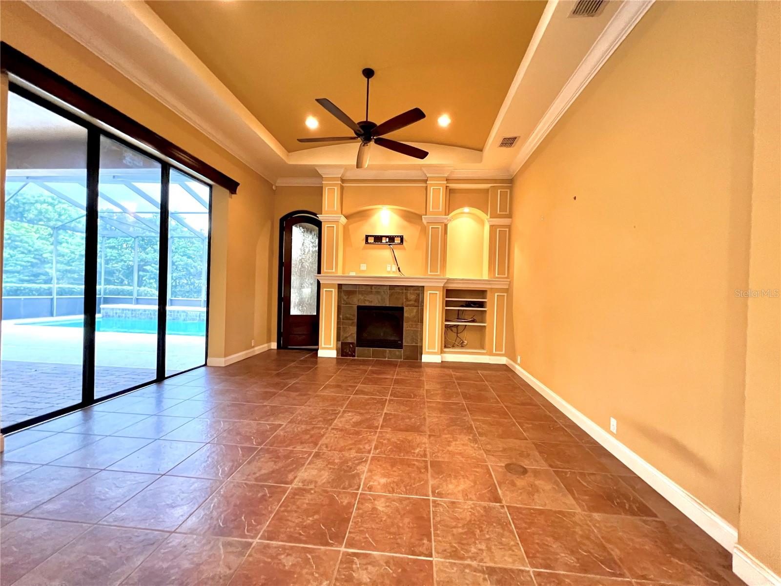 Cozy but classy family room w/ trey ceiling &amp; nice moulding