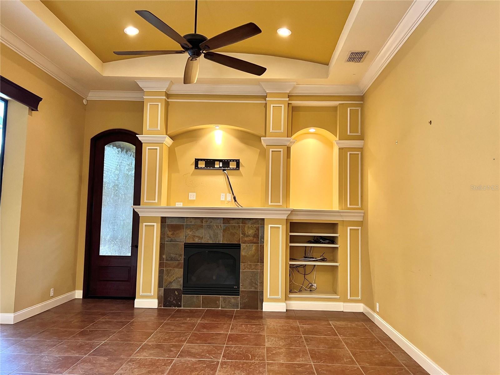 family room w/ trey ceiling &amp; fireplace