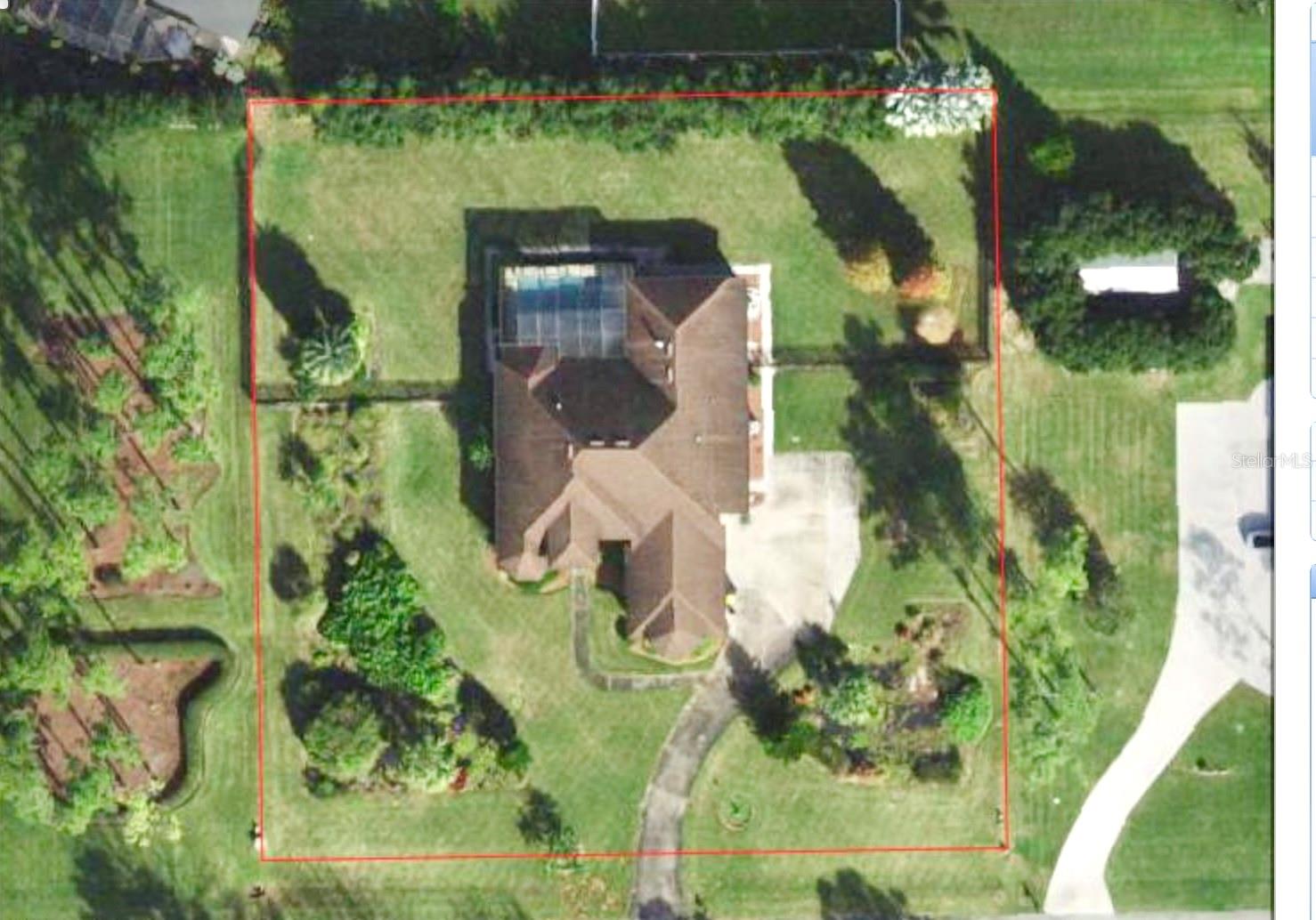 Aerial view of this lovely property on 1+ acres.