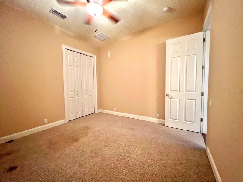 4th bedroom split from other rooms that could be part of an in-law suite