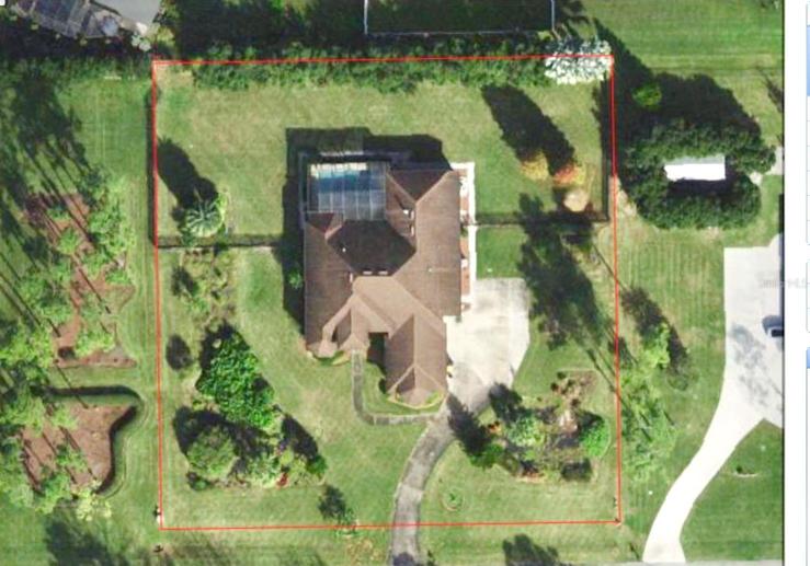 Aerial view of this lovely property on 1+ acres.