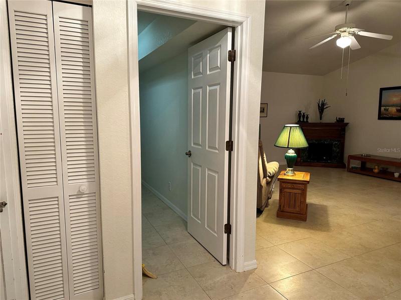 Hall closet and laundry room entry by family room