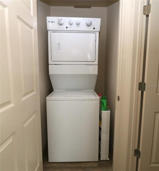 Stack washer/dryer in the hall.