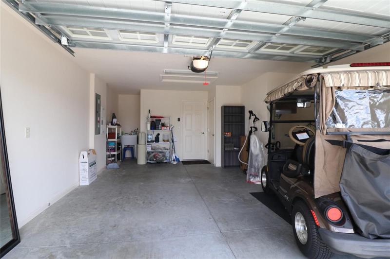 Garage fits car and golf cart