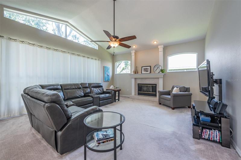 The family room is spacious and although we don't need a fireplace in Florida very often, it's a nice focal point year round.