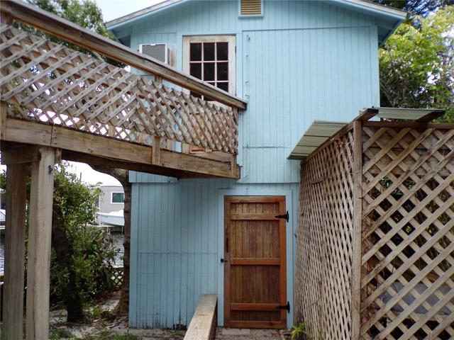 STORAGE AT BASE OF OUT BUILDING