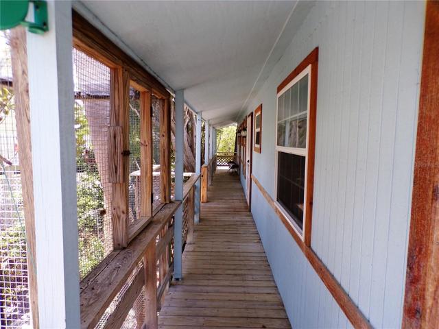 RIGHT SIDE WALKWAY WRAP AROUND PORCH