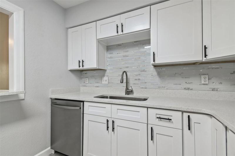 Stone counters and backsplash.