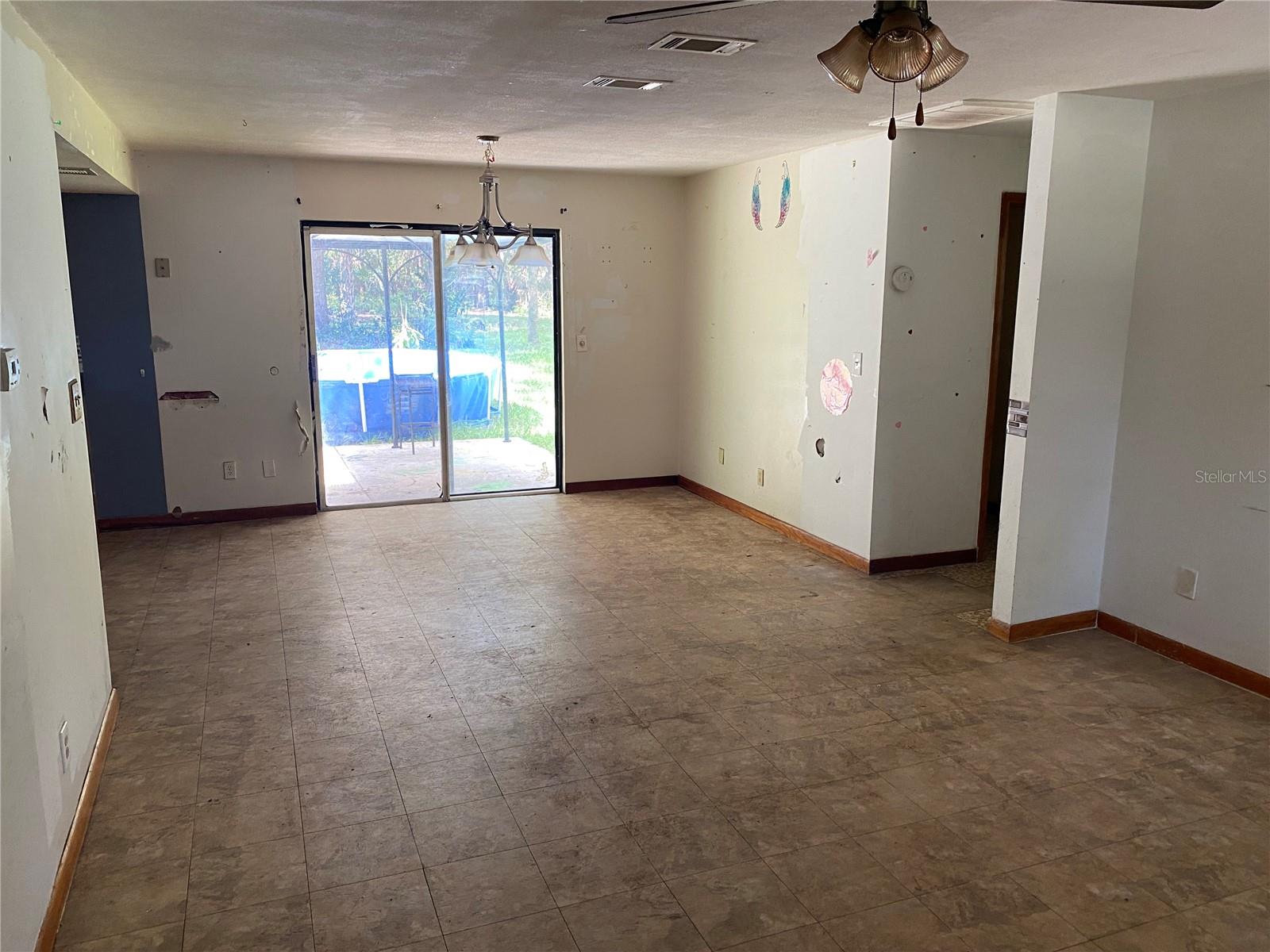 from the front door, living room/open dining room plan