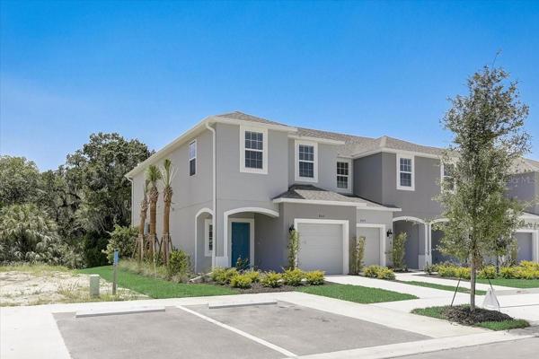 end unit with guest parking in front