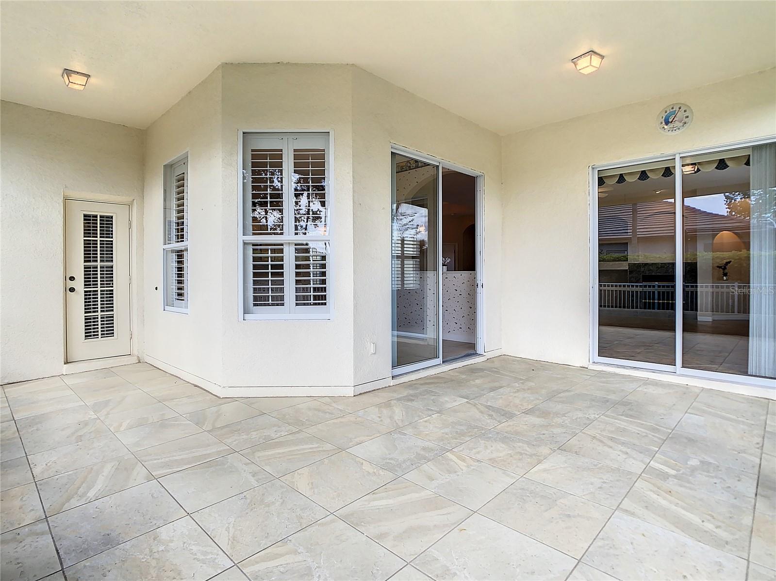 Another view of the lanai (left door goes to full bath)