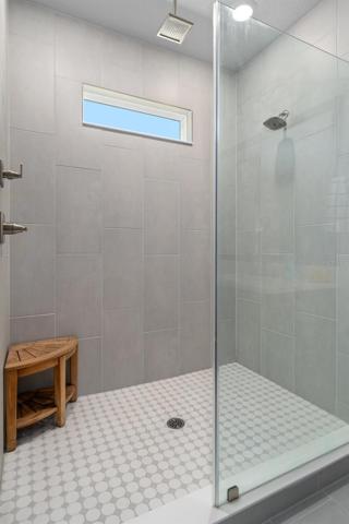 Owner's bathroom w overhead rain shower