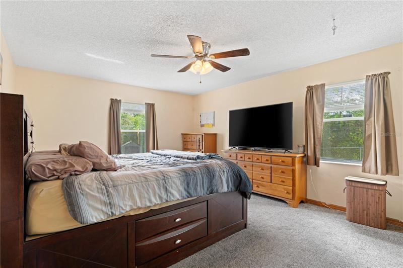 Master bed features 11' walk in closet