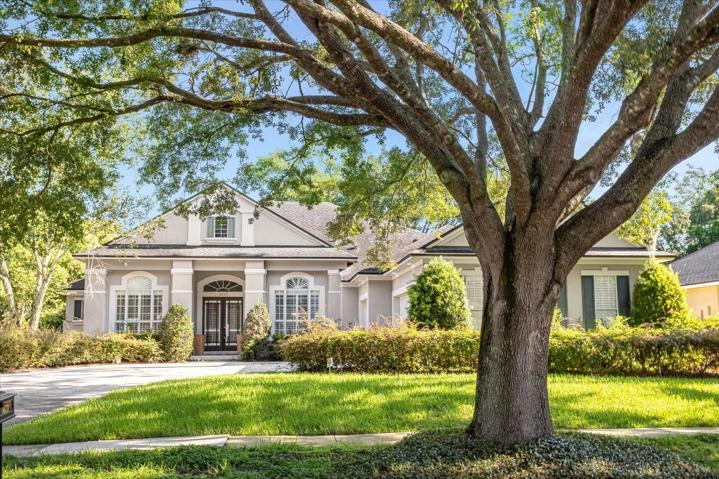 Front of house with three car garage
