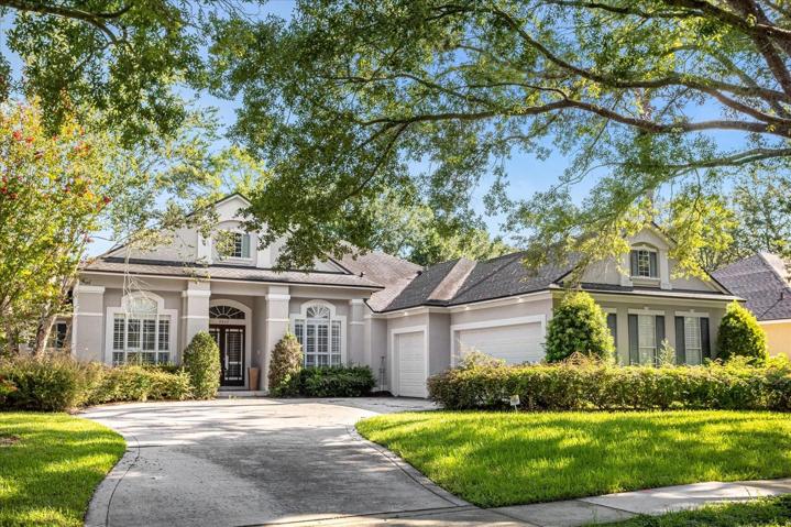 Front of house with 3 car garage