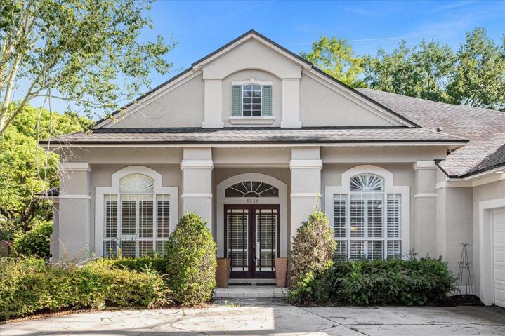 Front with three car garage on right