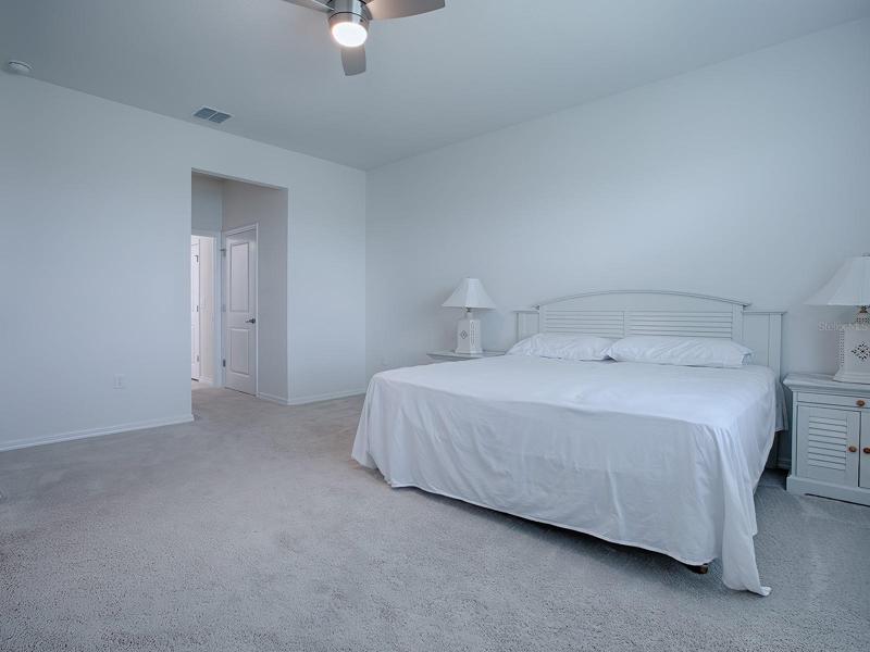 MASTER BEDROOM HAS AN ENSUITE MASTER BATH AND WALK-IN CLOSET