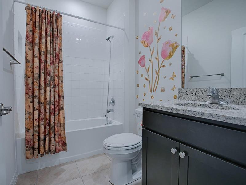 GUEST BATH HAS A TUB/SHOWER COMBO