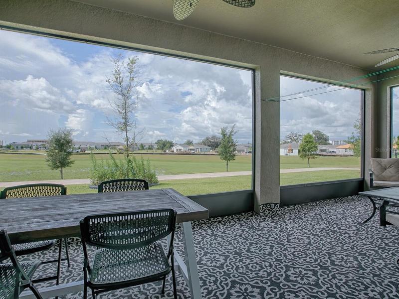 THIS HUGE LANAI HAS AN UNOBSTRUCTED VIEW... PERFECT FOR ENJOYING A BEAUTIFUL DAY!