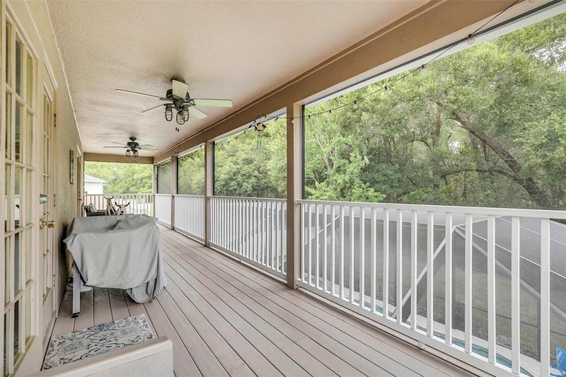 Covered balcony outside upstairs Loft /Primary Bedroom