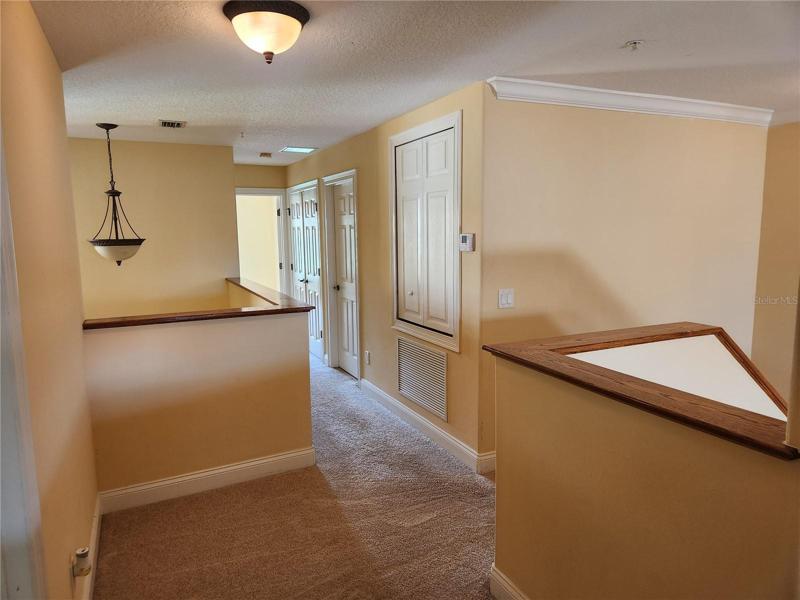 Upstairs landing area between bedroomsms