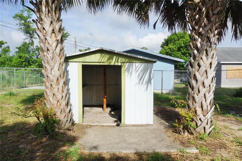 9x9 metal shed on a 13x13 concrete slab