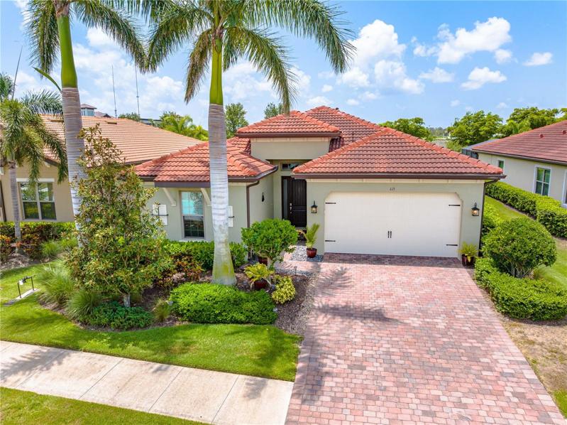 Front of home, paver driveway