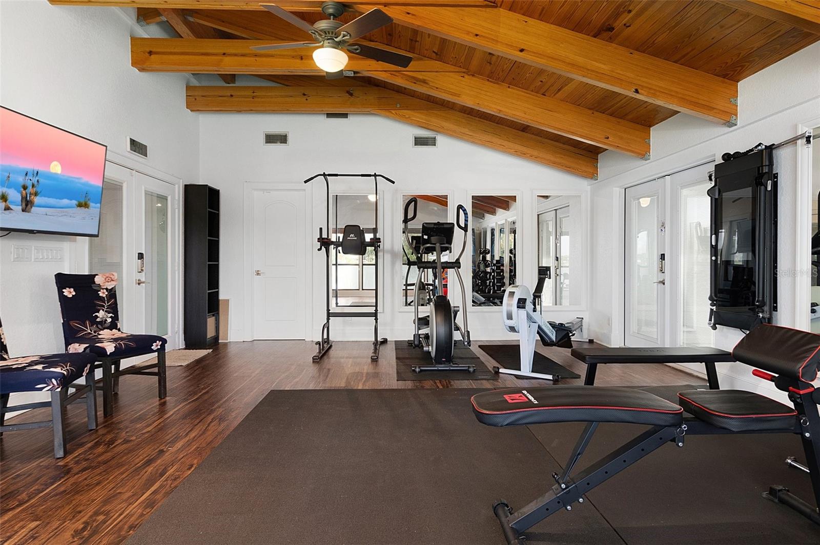 Billiard/Game Room currently being used as the Home Gym