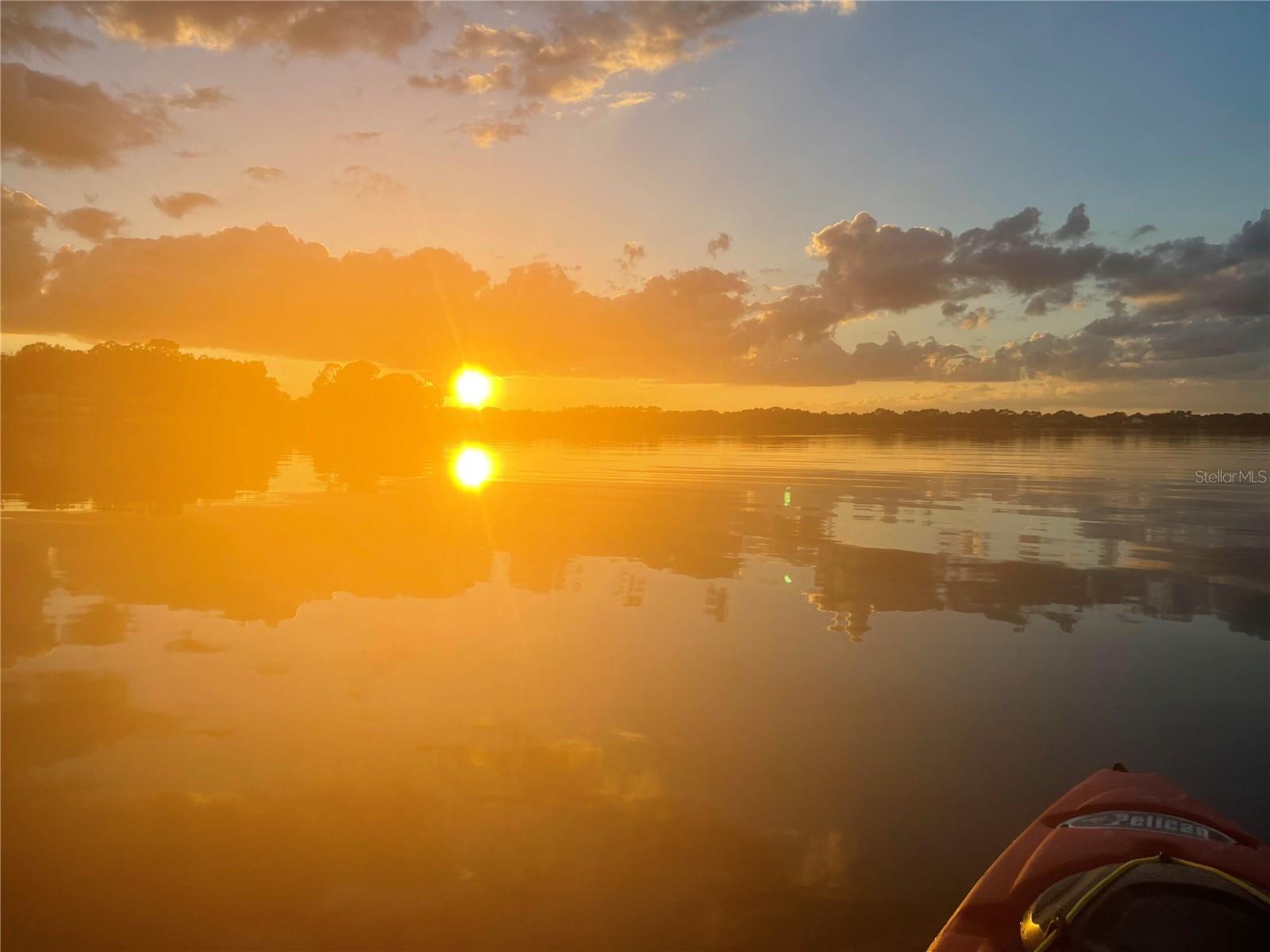 Sun reflecting on the lake at sunset