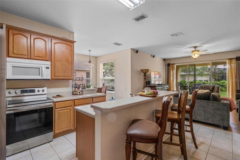Kitchen, breakfast nook and family room