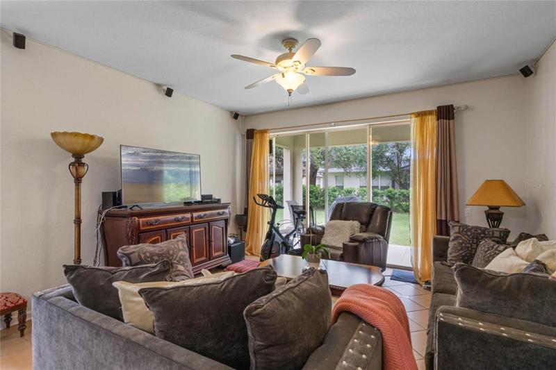 Family room and glass sliders to the back