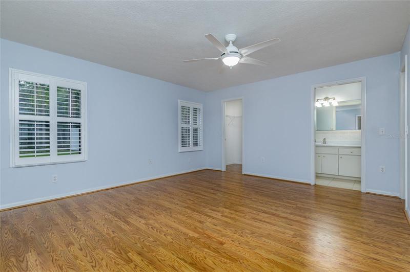 Master Bedroom with 2 walk-in closets and plantation shutters