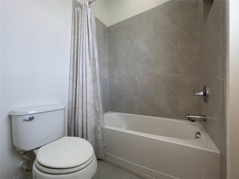 UPSTAIRS TUB WITH SHOWER