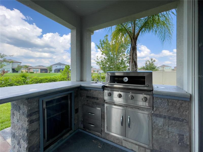 OUTDOOR KITCHEN OVERLOOKING PONE